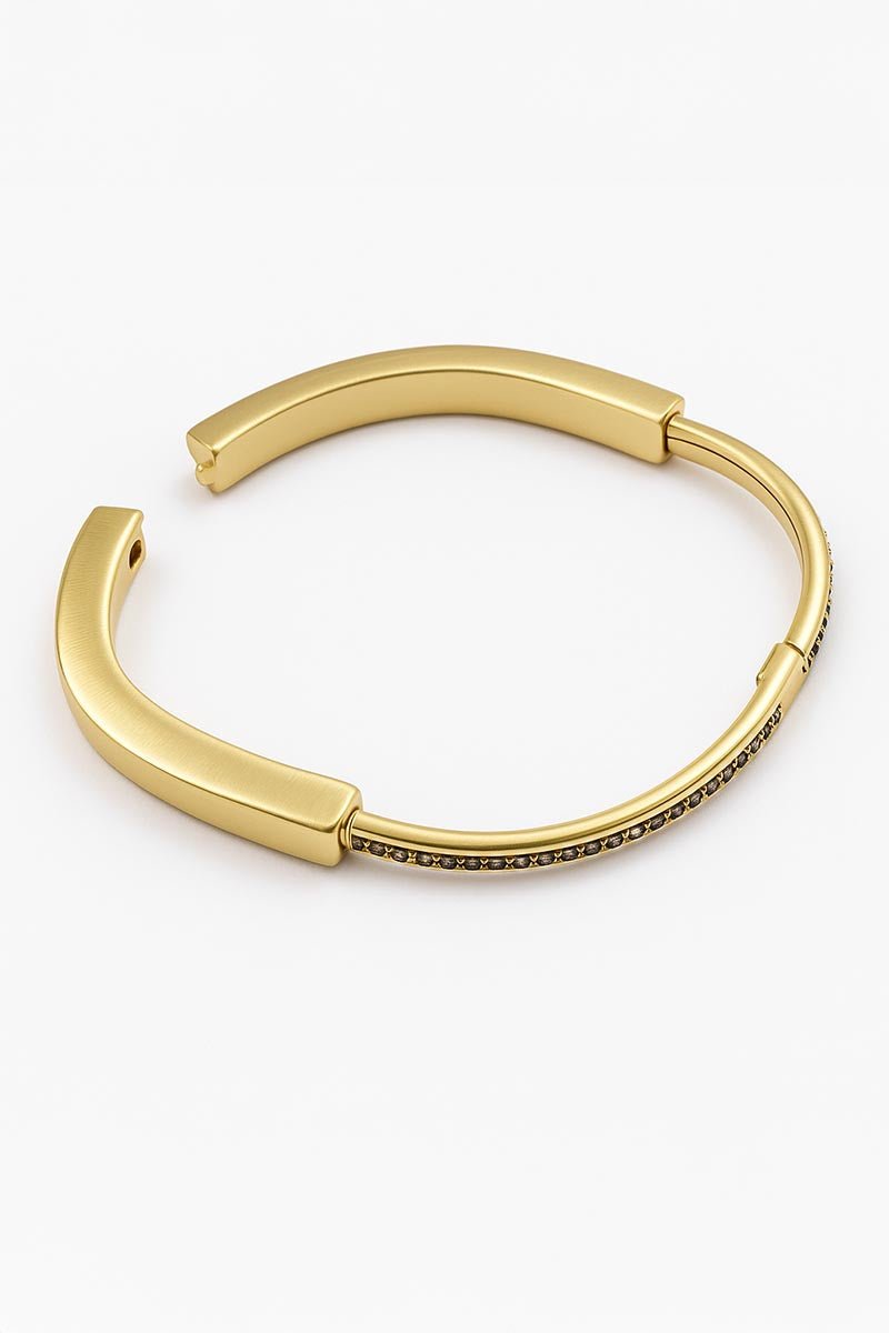 Modena Sculptural Gold Bangle - St geran