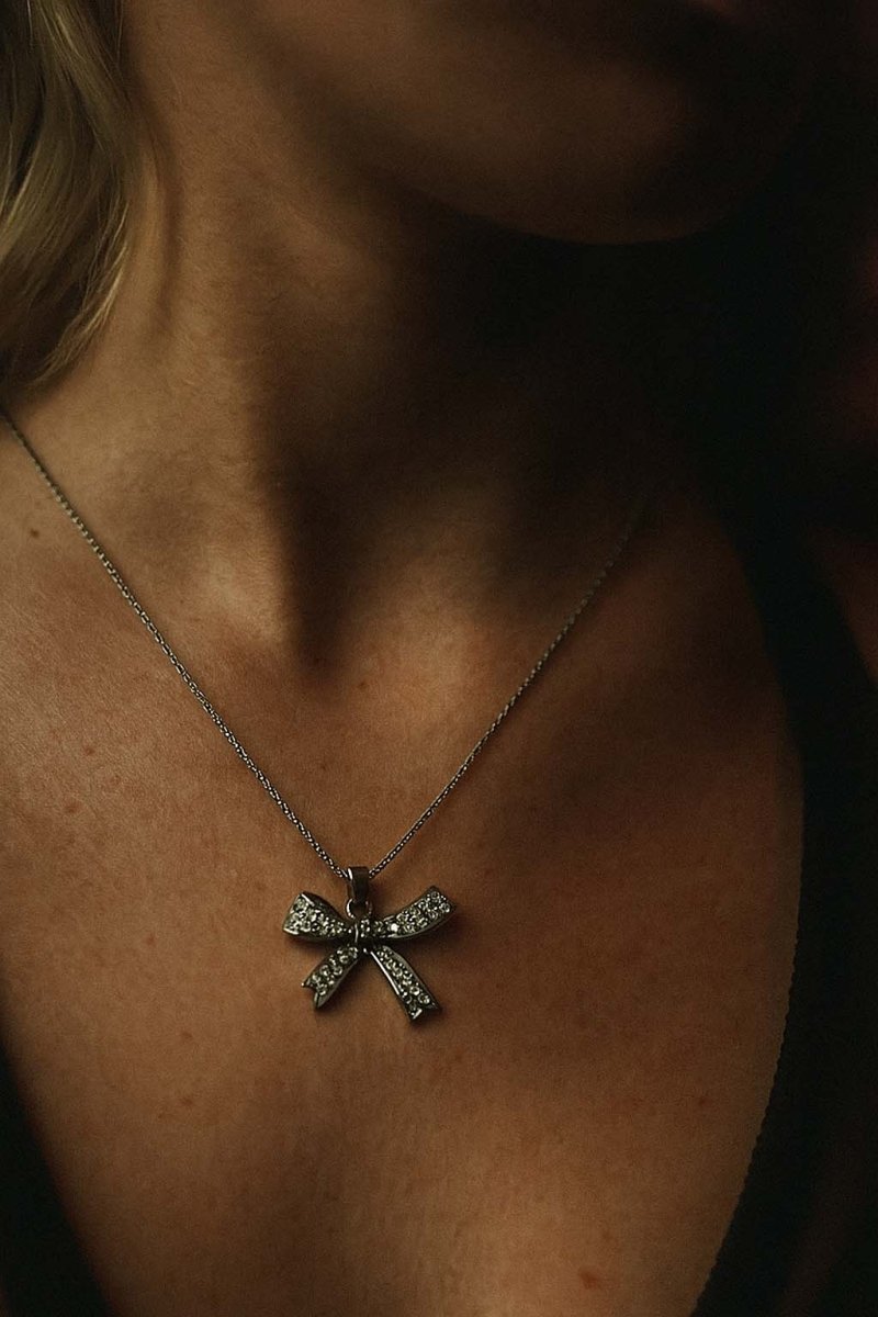 Silver Bow Pendant with Pavé Crystals – Elegant Ribbon Necklace Charm - St geran